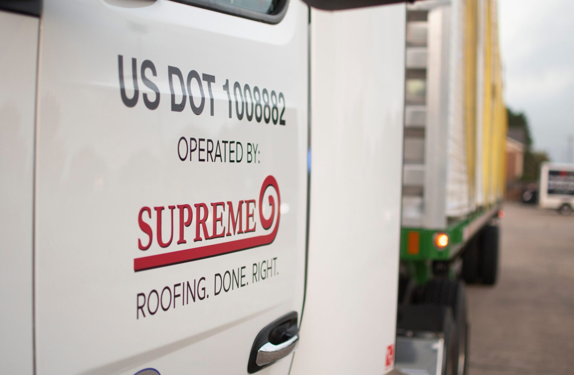Supreme roofing logo.