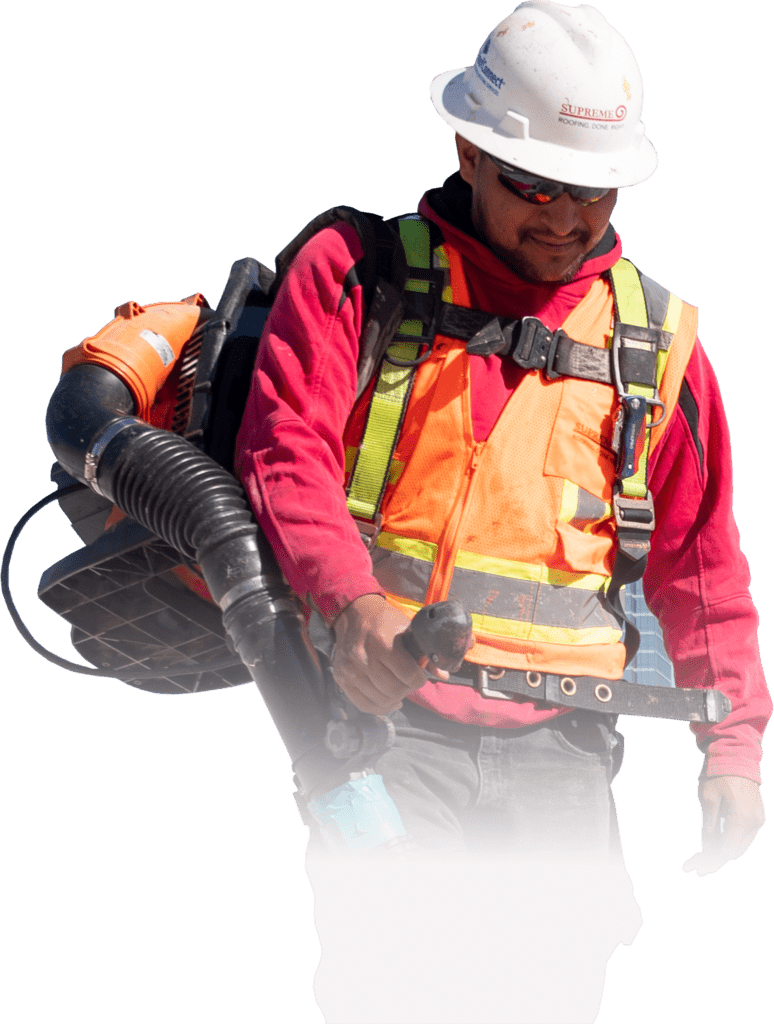 Roofer with safety equipment.